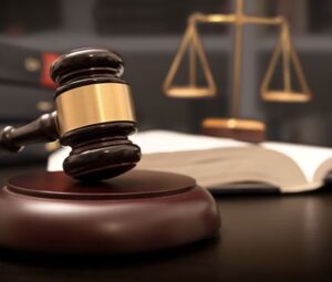 Gavel in foreground, scales in background