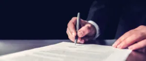 Person Signing An Official Document