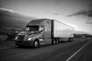 Semi truck traveling down a highway