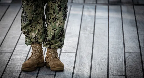 A soldier stands at the ready.